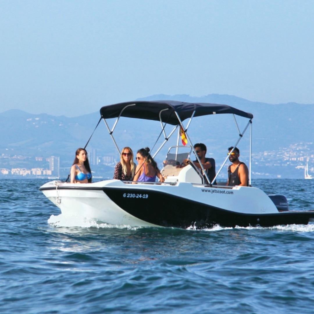 Rent a boat and explore barcelona with your friends